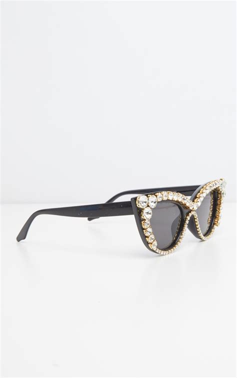 black pointy cat eye sunglasses with feathers